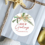 Sticker Rond Tropical Christmas Starfish Seas N Salutations<br><div class="desc">Ces autocollants de Noël tropicaux confèrent aux enveloppes des sceaux magnifiques pour ajouter une touche de plage côtière à votre courrier de vacances,  avec deux étoiles de mer décorées de feuilles saints,  de baies et de sprigs de pin,  et la plage disant "mers n’salutations".</div>