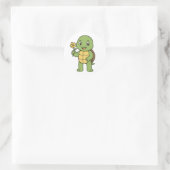 Sticker Rond Turtle holding a flower (Sac)