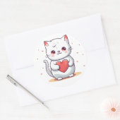 Sticker Rond Un adorable chat tenant un coeur (Enveloppe)