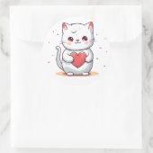 Sticker Rond Un adorable chat tenant un coeur (Sac)