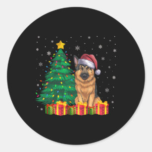 Sticker Rond Un berger allemand moche Santa Hat Les lumières de