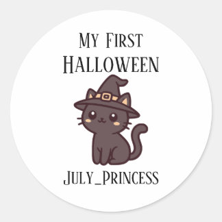 Sticker Rond Un chat portant un chapeau pour les amateurs de ch