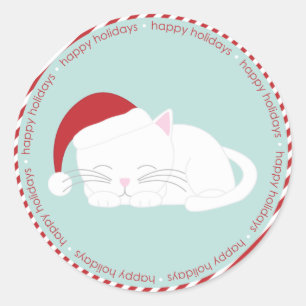 Sticker Rond Un chat qui fait la sieste porte un chapeau de Pè