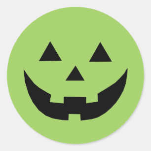 Sticker Rond Un citrouille Jack-o'-lantern vert amusant face Ha
