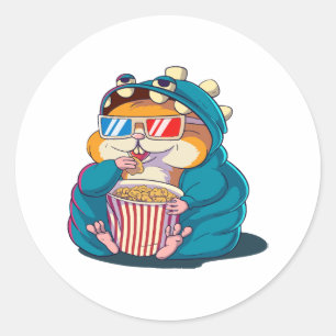 Sticker Rond Un hamster drôle portant des lunettes mange du pop