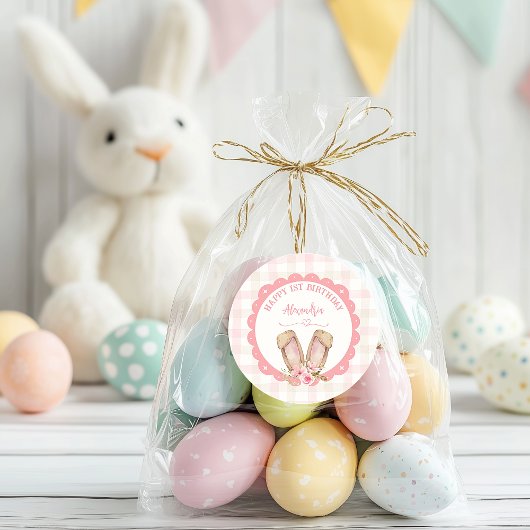 Sticker Rond Un Lapin Est En Train De Tourner Une Fille Rose