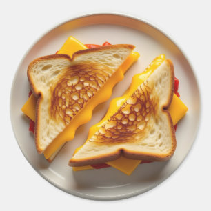 Sticker Rond Un sandwich au fromage grillé sur une assiette