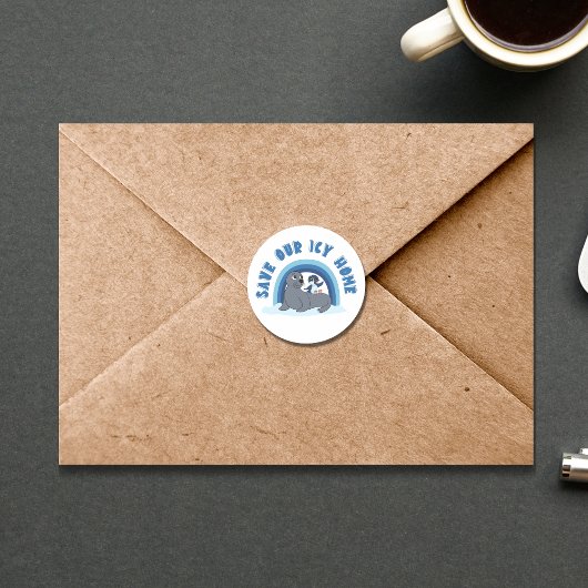 Sticker Rond Un sceau et un pingouin "Save Our Icy World" dessi