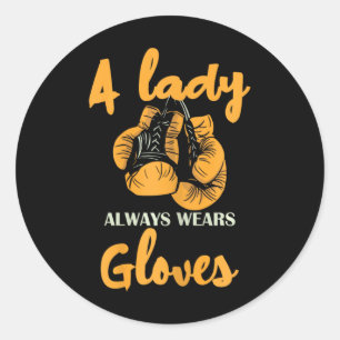 Sticker Rond Une Dame Porte Toujours Des Gants De Boxe Puissanc
