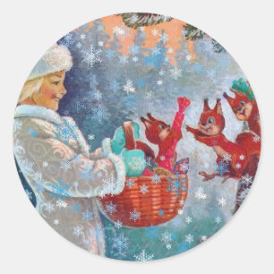 Sticker Rond Une jolie fille et des écureuils à Noël