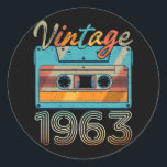 Sticker Rond Vintage 1963 Cassette Tape Retro 60th Birthday 60<br><div class="desc">Awesome tee Ideas People who born in 1963 Retro Vintage Classic Old School 60th Awesome tee Ideas for Men Women. 60 years old awesome vintage birthday. Complete happy birthday decorations .Your birthday party will be funny, awesome, epic & legendary. If u grew up in the seventies, eighties, or nineties you...</div>