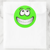 Sticker Rond Visage des yeux fous verts (Sac)