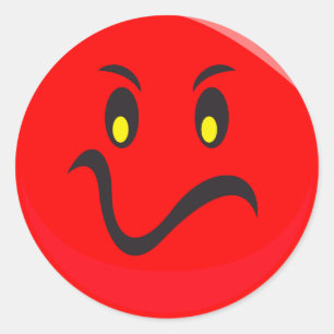 Sticker Rond visage rouge furieux