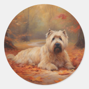 Sticker Rond Wheaten Terrier dans les feuilles d'automne automn