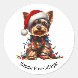 Sticker Rond Yorkshire Terrier sur un chapeau de Père Noël et l
