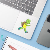 Sticker Tortue en course (Ordinateur portable avec iPhone)