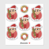 Sticker Un petit mignon tenant un cadeau de Noël (Feuille)
