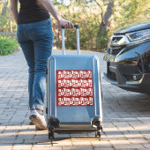 Sticker Un tapis rouge avec un motif texturé est étalé sur (Valise Insitu)