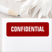 Stickers en rouge gras petits et confidentiels (En situation)