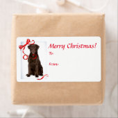 Stickers voor kerstcadeaus met chocolade in het la (Insitu)