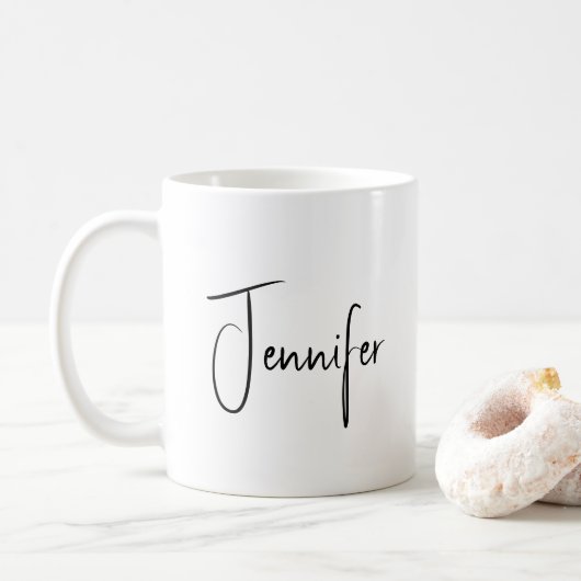 Stijlvol grafisch script met minimalistisch monogr koffiemok (Met donut)
