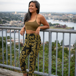 Stijlvolle  gouden bloemenprint op zwart leggings