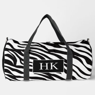 Stijlvolle zwart-wit zebraprint met initialen plunjezak