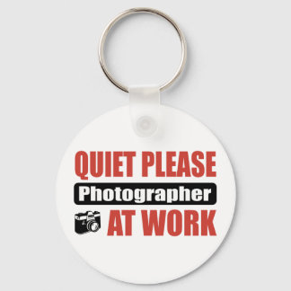 Stil alsjeblieft fotograaf op het werk sleutelhanger