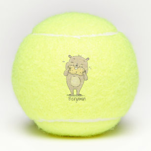 Stomme glimlachende hamster met pinda-cartoon tennisballen