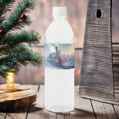 stoomtrein winterbesneeuwde bergen waterfles etiket