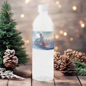 stoomtrein winterbesneeuwde bergen waterfles etiket