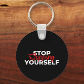 Stop met jezelf typografie sleutelhanger (Voorkant)