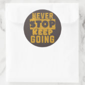 Stop nooit met doorgaan ronde sticker (Tas)