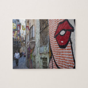 Straatkunst op Calle de la Libertad straat Legpuzzel