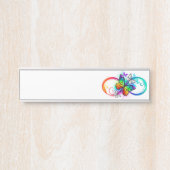 Stralende oneindigheid met regenboogvlinder deurbordje (Voorkant)