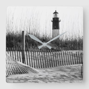Strand hekken en vuurtoren vierkante klok