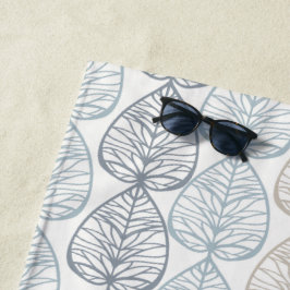 Strandlaken met abstracte planten ornamenten.