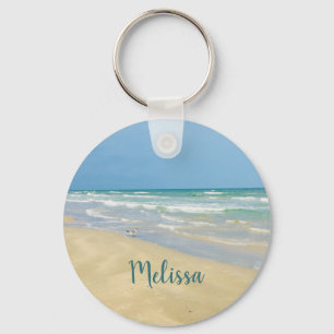 Strandloper op het strand Mooie strand Sleutelhanger
