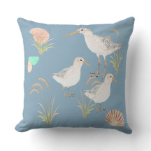 strandlopers op de kust van zeegras