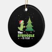 Struggle is een echte dinosaurus kerstboom keramisch ornament (Links)