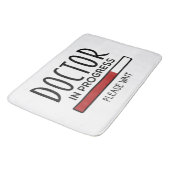 Student-docent van de universiteit in opleiding badmat (Gekanteld)