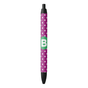Stylo Noir Motif pois violets sur fond vert avec monogramme