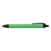 Stylo Noir Un écran vert vif posé contre un bar blanc propre (Haut)