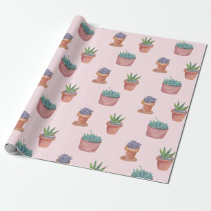 Succulte en cacti op roze cadeauomslag achtergrond cadeaupapier