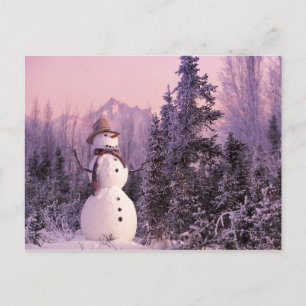 Sunset Snowman in het wintergebergte Briefkaart
