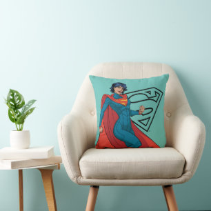 Supergirl zweven in blauw pak kussen