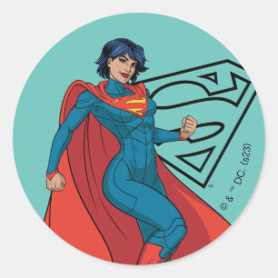 Supergirl zweven in blauw pak ronde sticker