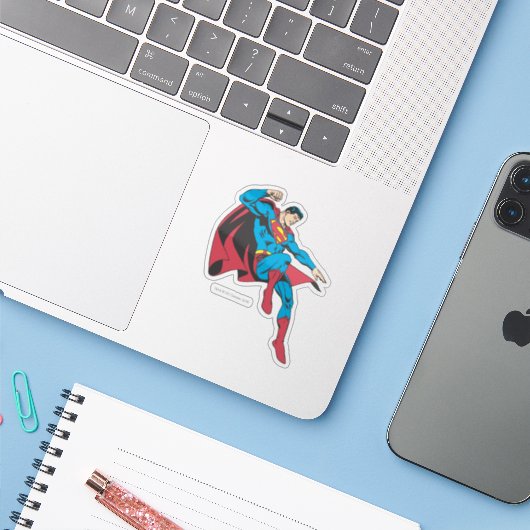 Superman Flying Backwards Sticker (Laptop met iPhone)