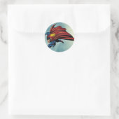 Superman flys met cape ronde sticker (Tas)