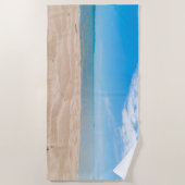 Sur la serviette de plage de sable (Devant)